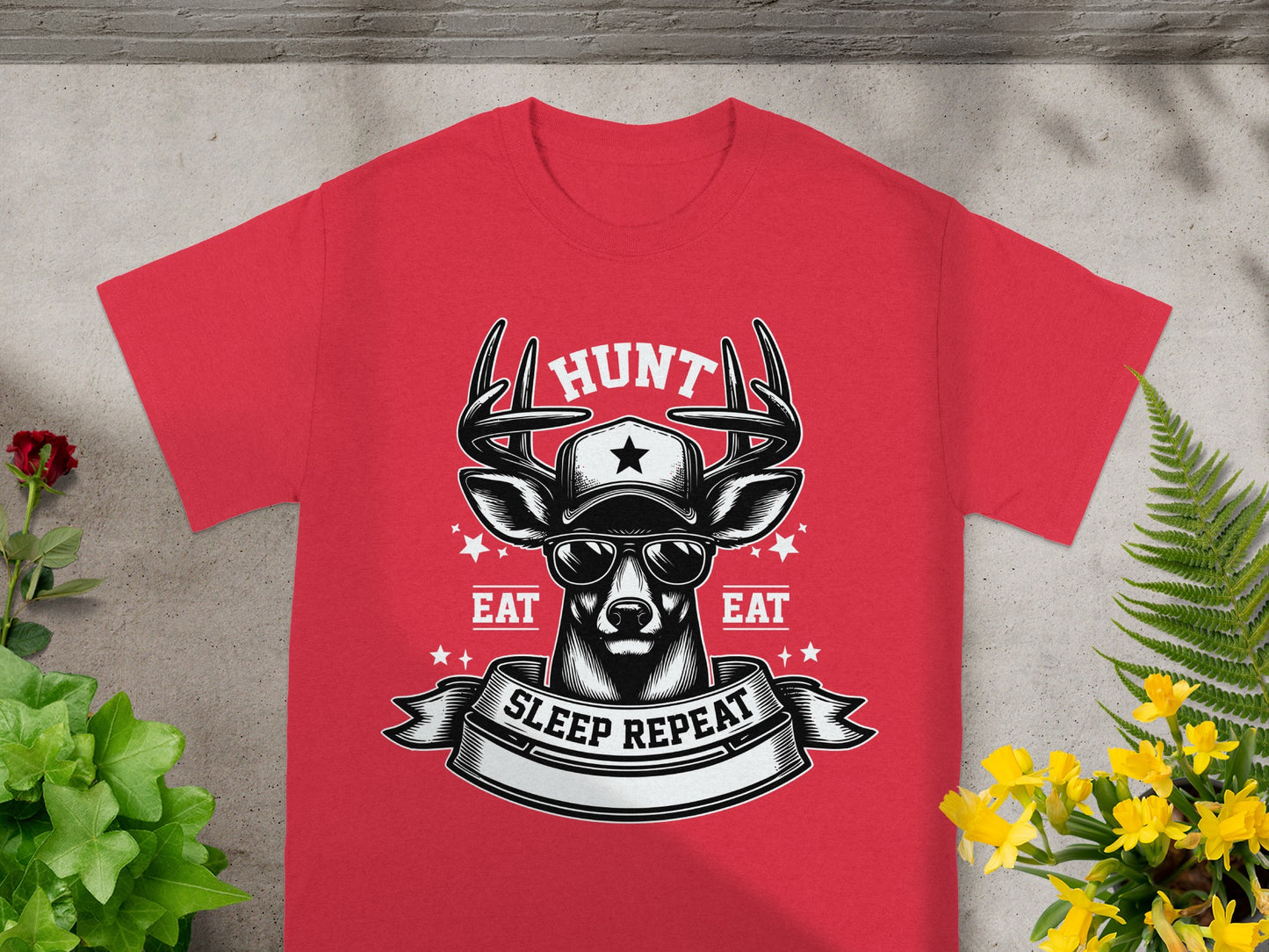 Red t-shirt with deer wearing sunglasses, cap, and text "HUNT EAT SLEEP REPEAT".