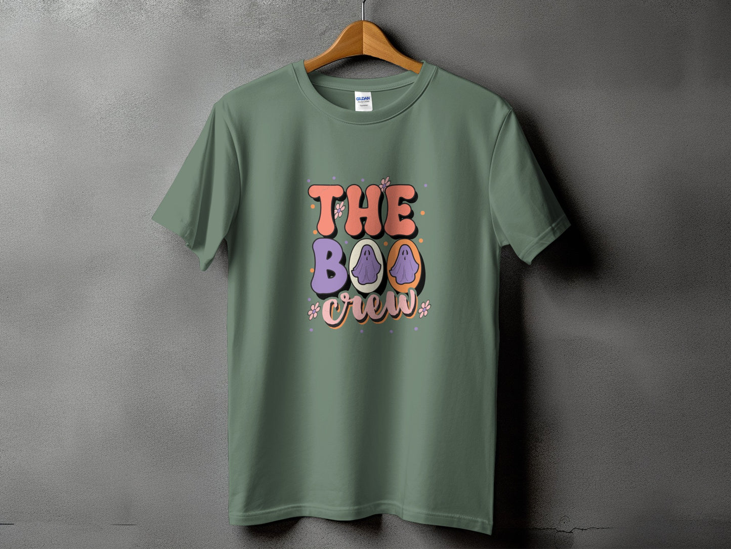 Green t-shirt with "THE BOO CREW" text and ghost graphics.