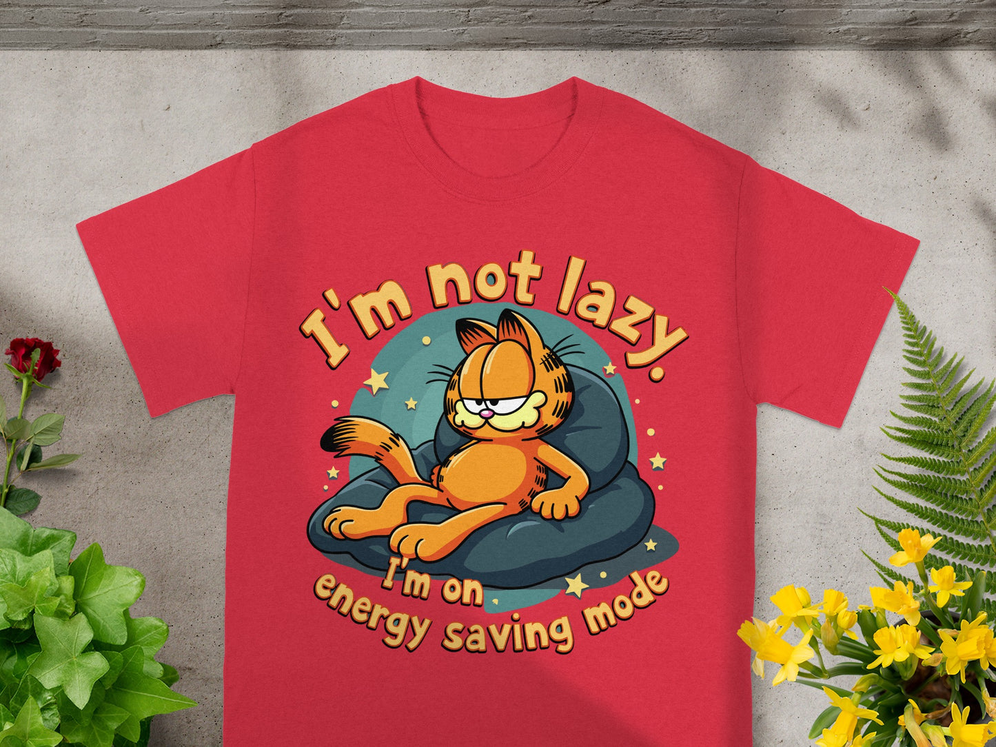Red t-shirt with Garfield lounging and text "I'm not lazy. I'm on energy saving mode."