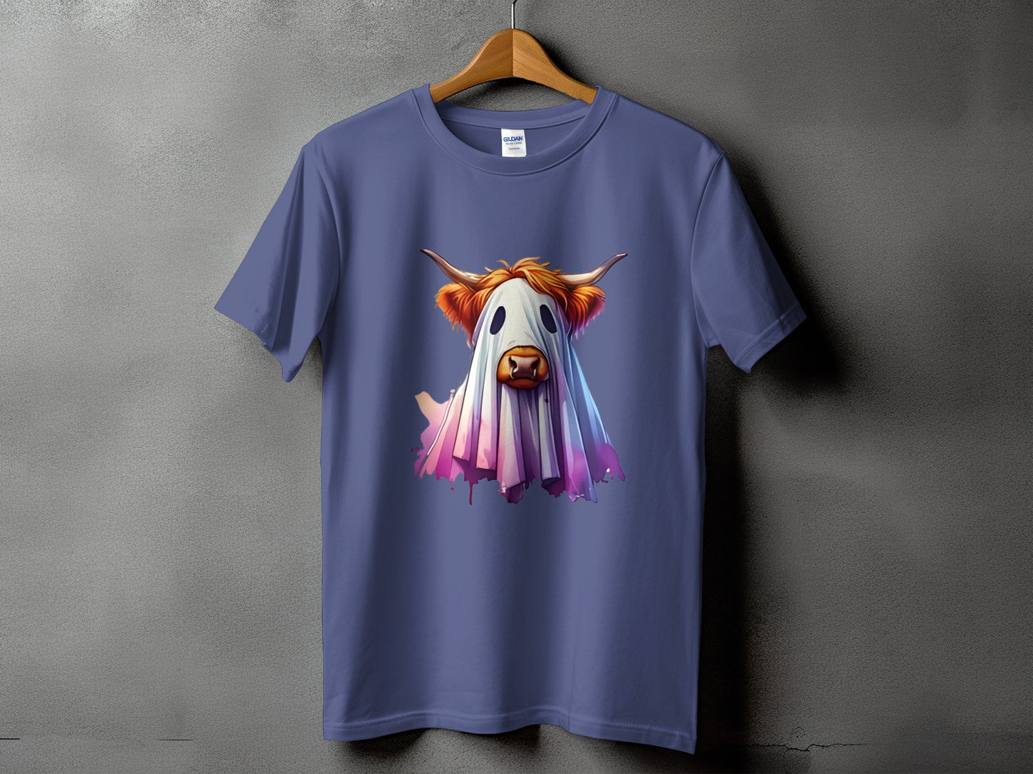 Purple t-shirt with a Highland cow dressed as a ghost graphic.
