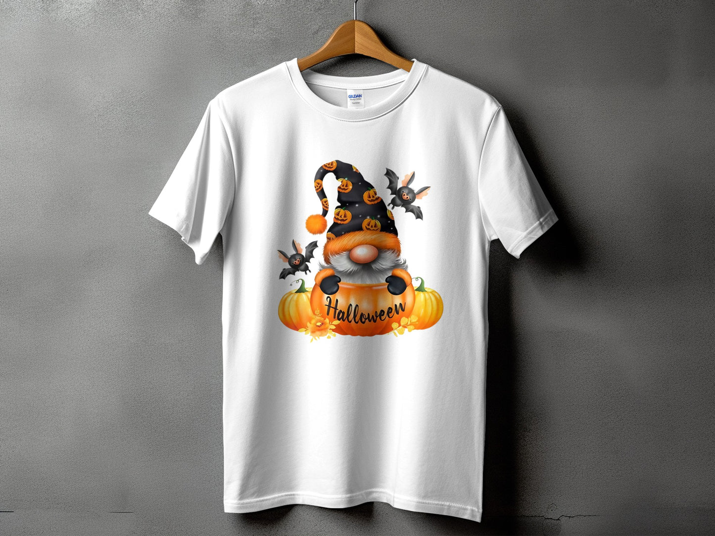 White t-shirt with a Halloween gnome, pumpkins, bats, and "Halloween" text.