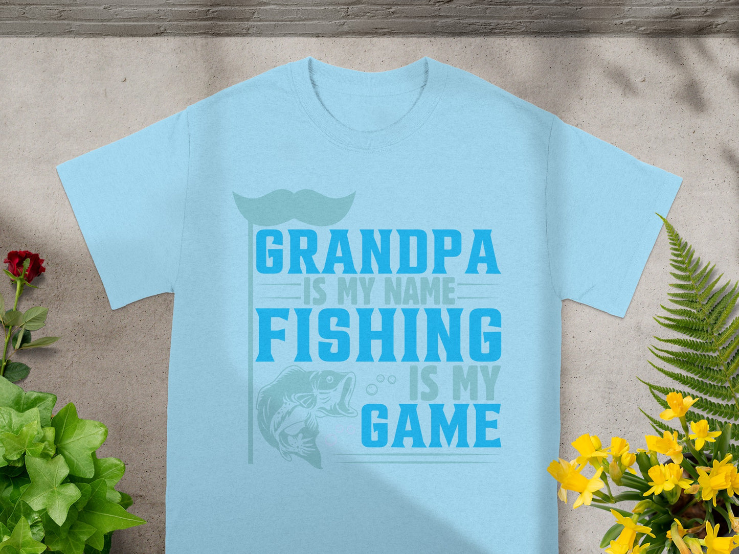 Light blue t-shirt with "GRANDPA IS MY NAME FISHING IS MY GAME" text.