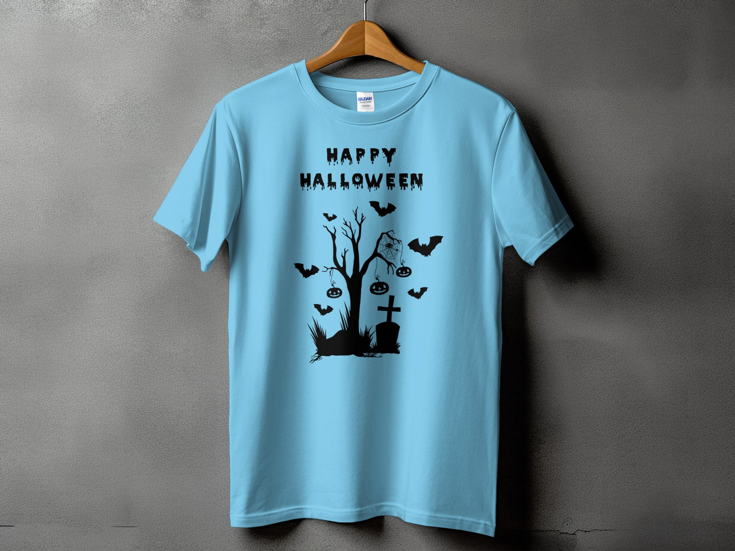 Light blue t-shirt with black "Happy Halloween" text and a graveyard scene graphic.