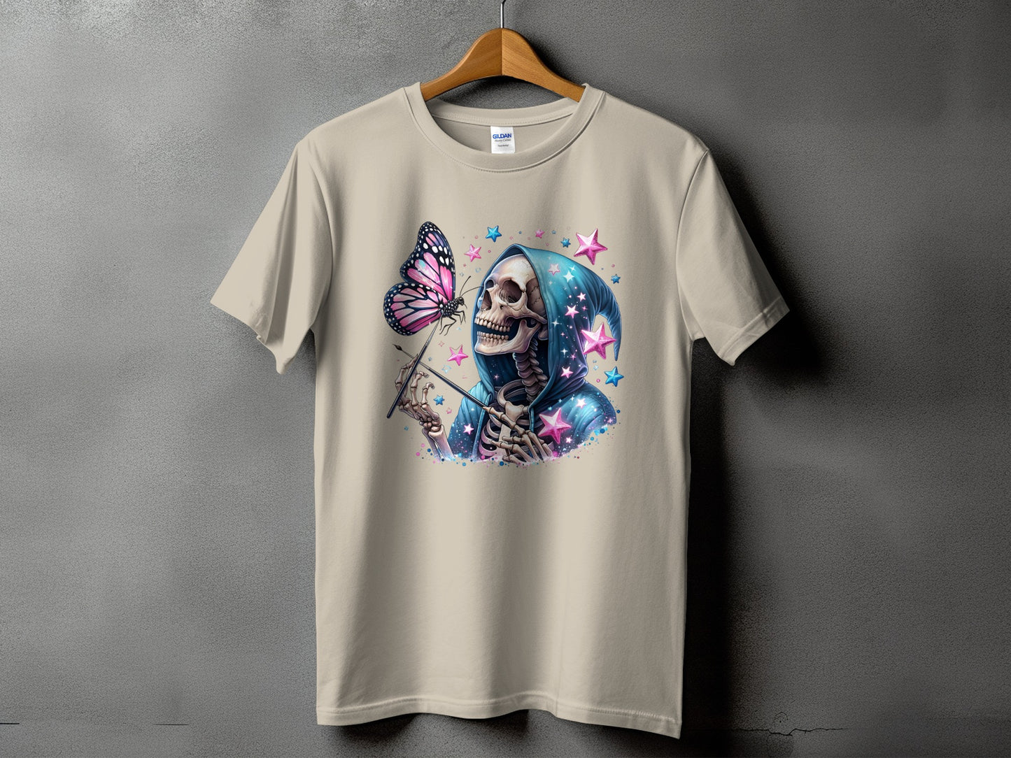 Skeleton in blue hoodie with butterfly and pink and blue stars