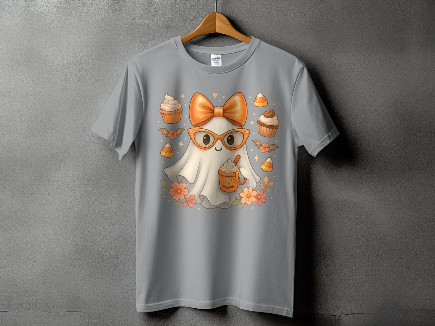 Ghost wearing glasses and bow with cupcakes, candy corn, and flowers.