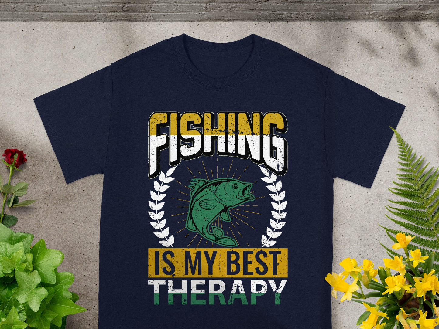 Navy t-shirt with "FISHING IS MY BEST THERAPY" text and a fish graphic.