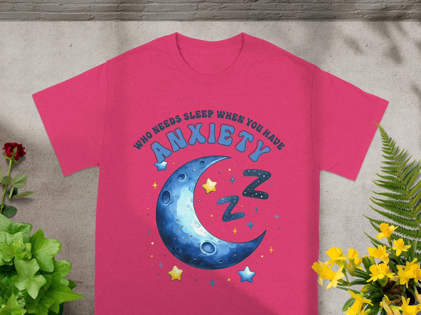 Pink t-shirt with "WHO NEEDS SLEEP WHEN YOU HAVE ANXIETY" and moon graphic.