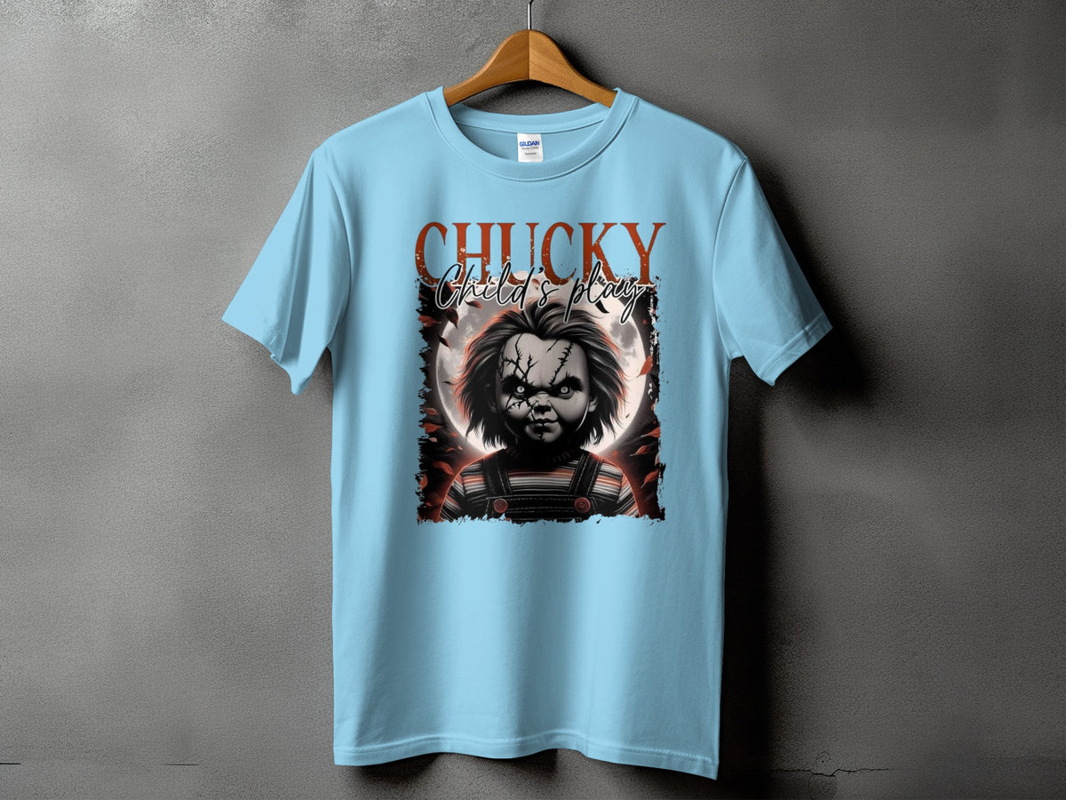 Light blue t-shirt with Chucky "Child's Play" graphic on a hanger.