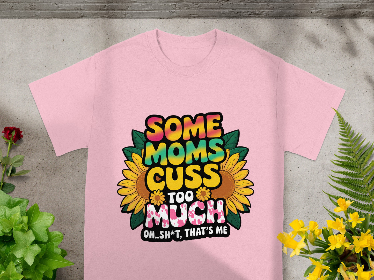 Pink t-shirt with "Some Moms Cuss Too Much" text and sunflowers.