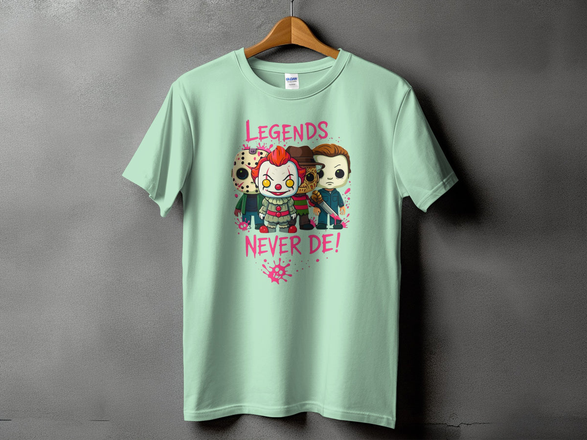 Mint green t-shirt with cartoon horror characters and text "LEGENDS NEVER DE!".