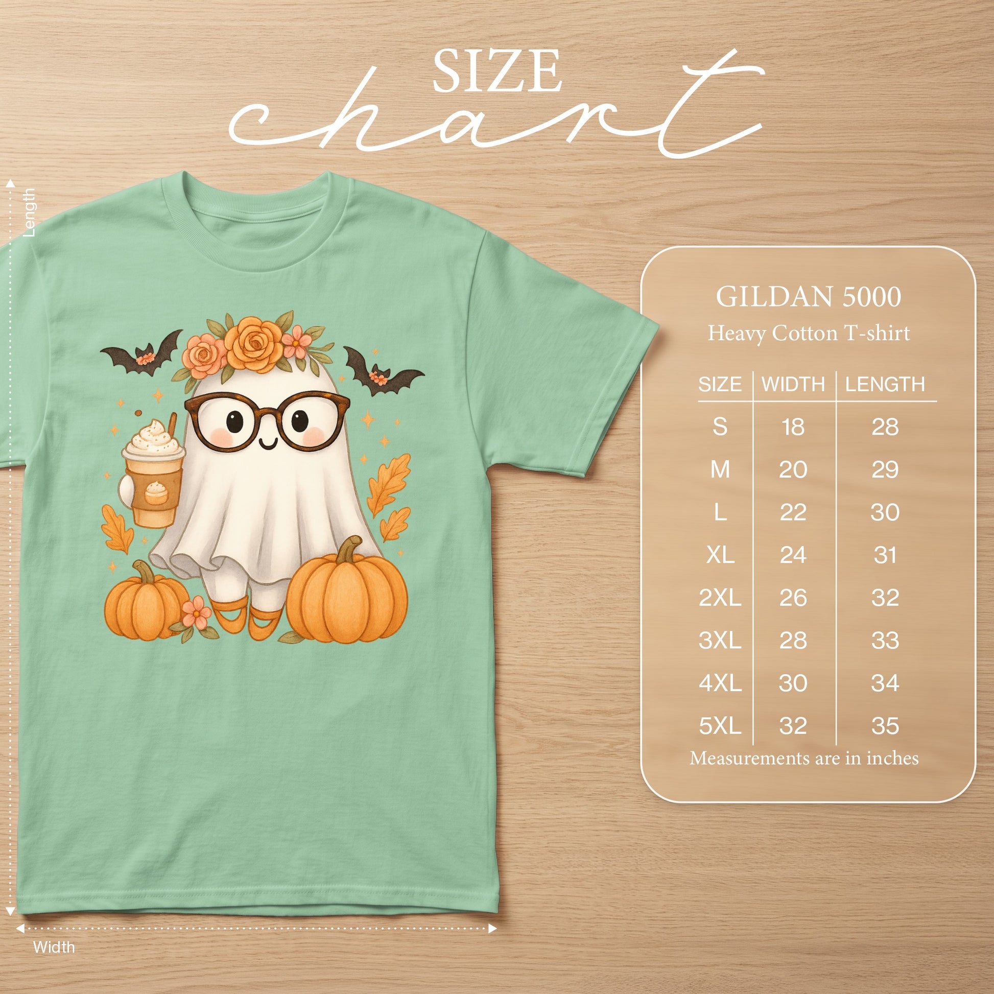 Light mint green t-shirt with a cute ghost, pumpkins, bats, and coffee graphic. Includes size chart.