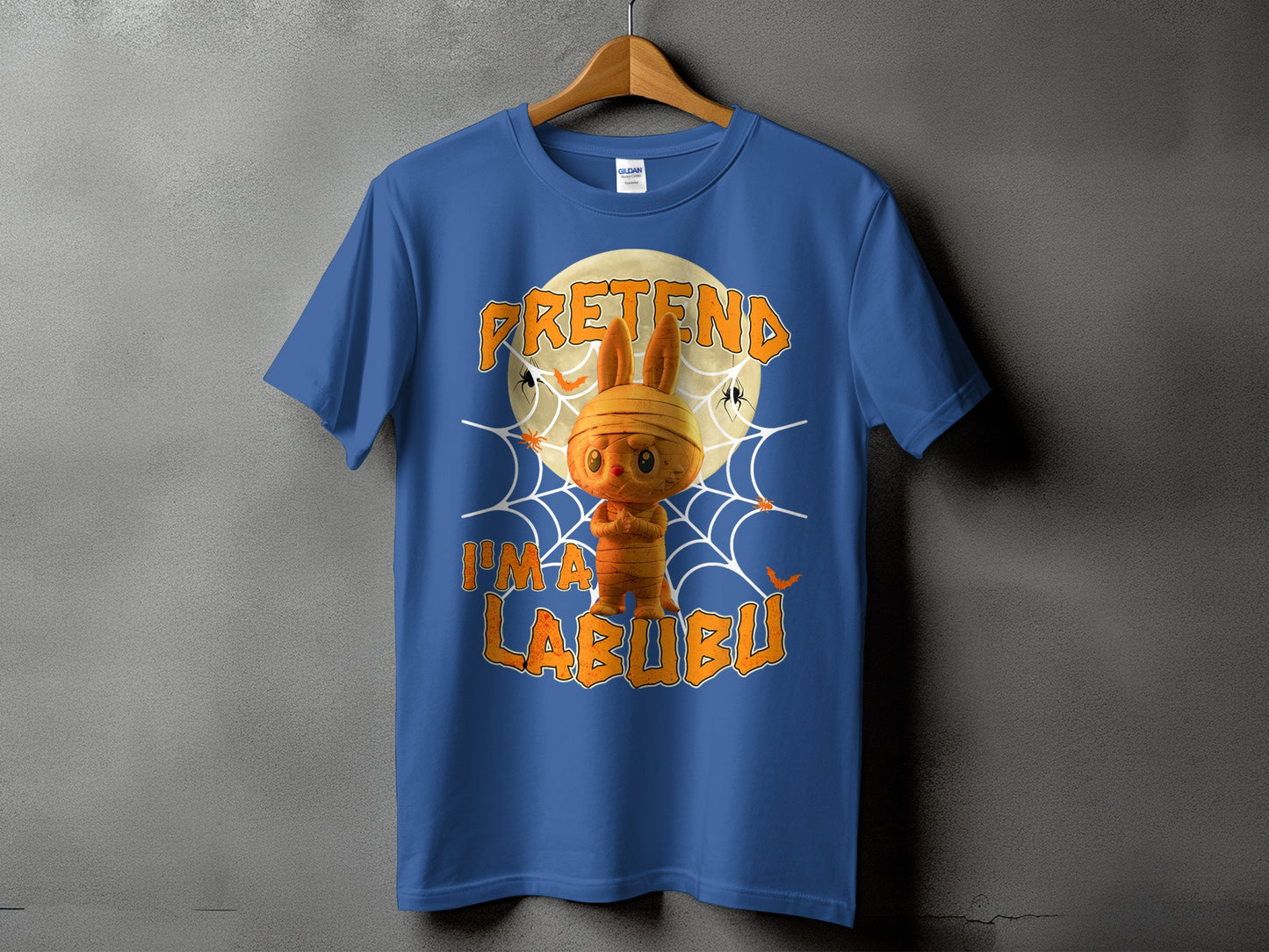 Blue t-shirt with Halloween graphic: "Pretend I'm a Labubu" and mummy bunny.