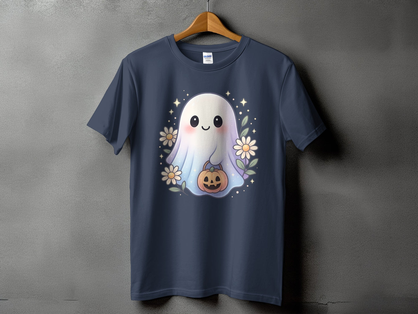 Dark blue t-shirt with a cute ghost holding a pumpkin, surrounded by flowers and stars.