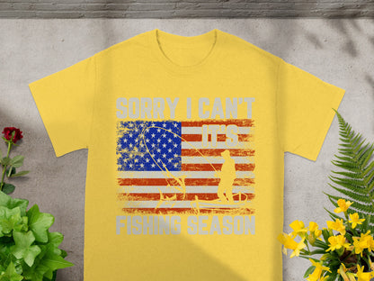 Yellow t-shirt with American flag and graphic: "Sorry I can't, it's fishing season".