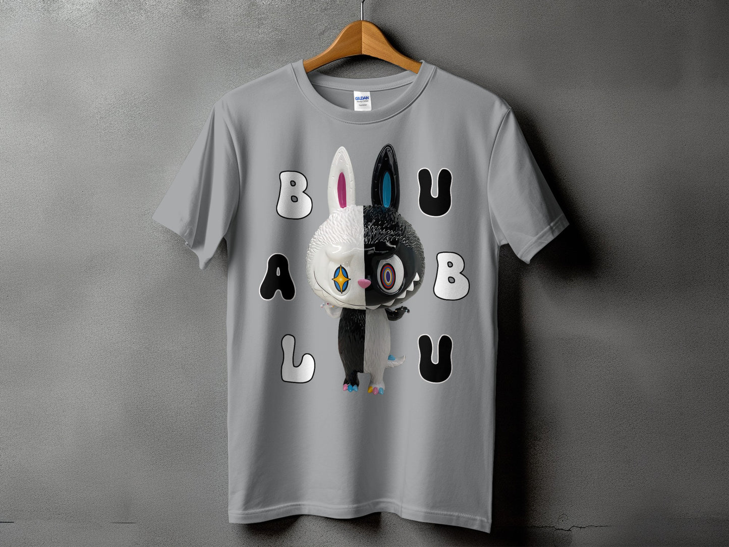 Grey t-shirt with a graphic of a black and white split bunny and text "BALU".