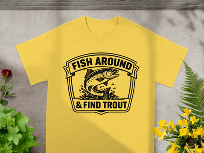 Yellow t-shirt with "FISH AROUND & FIND TROUT" and flying trout graphic.