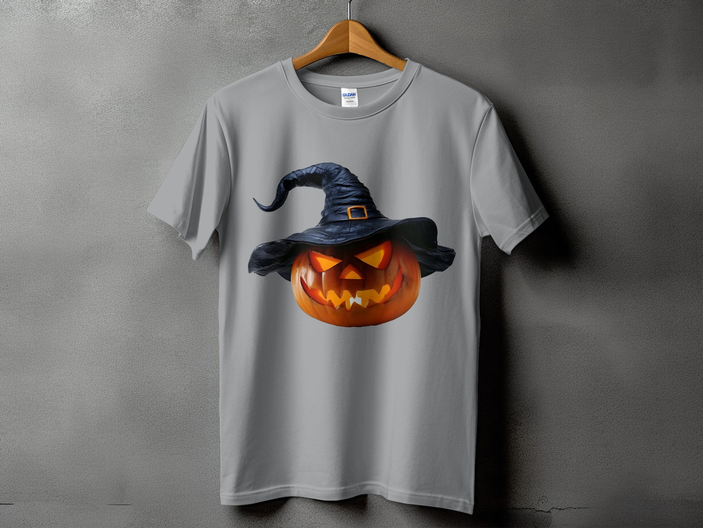 Gray t-shirt with a jack-o'-lantern wearing a black witch hat.