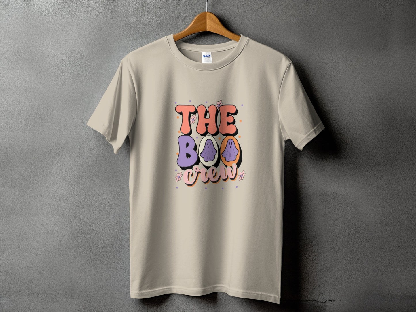 Light tan t-shirt with "The Boo Crew" text and ghost graphic.
