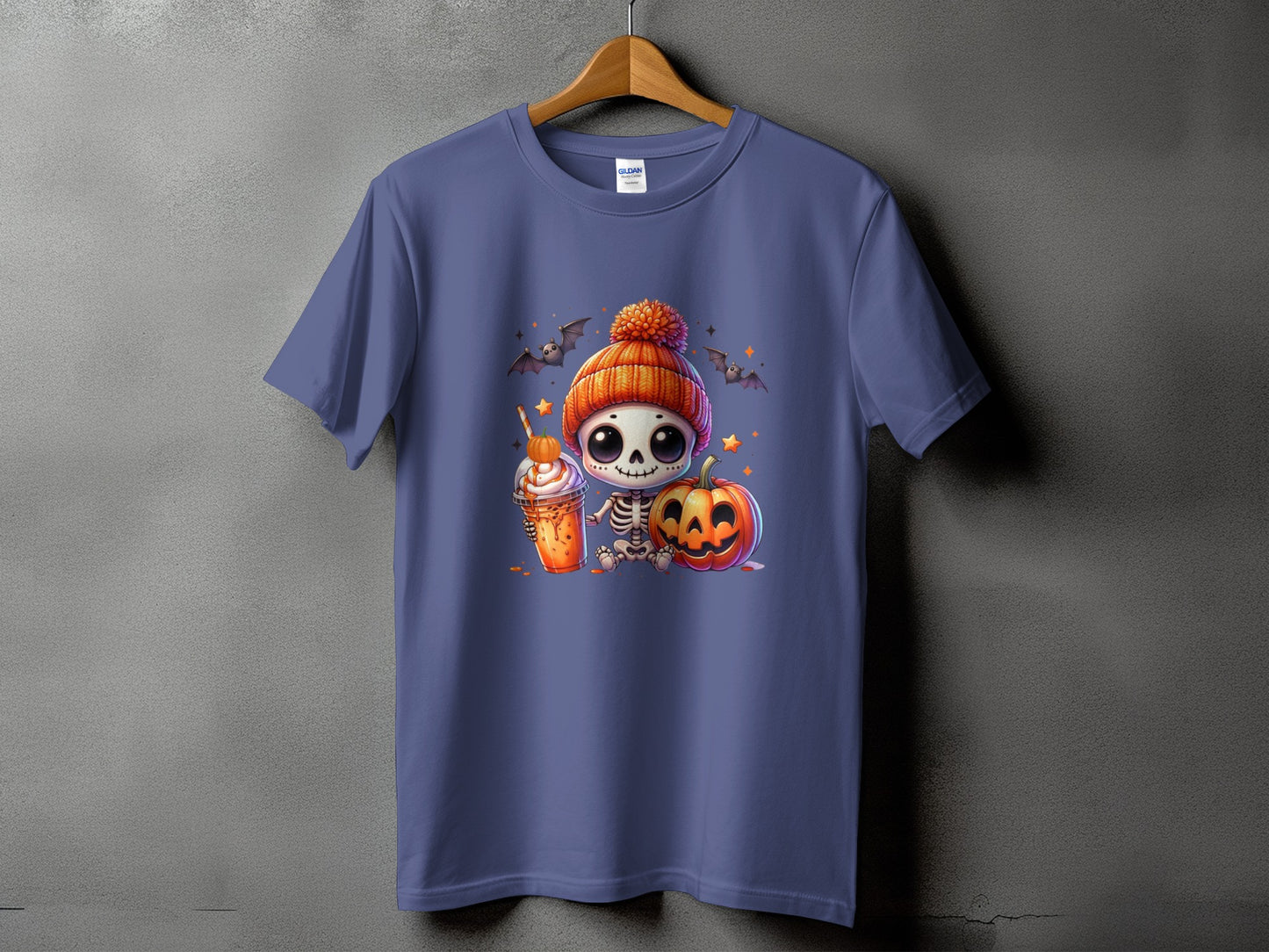 T-shirt with cute skeleton, pumpkin, and latte Halloween graphic.
