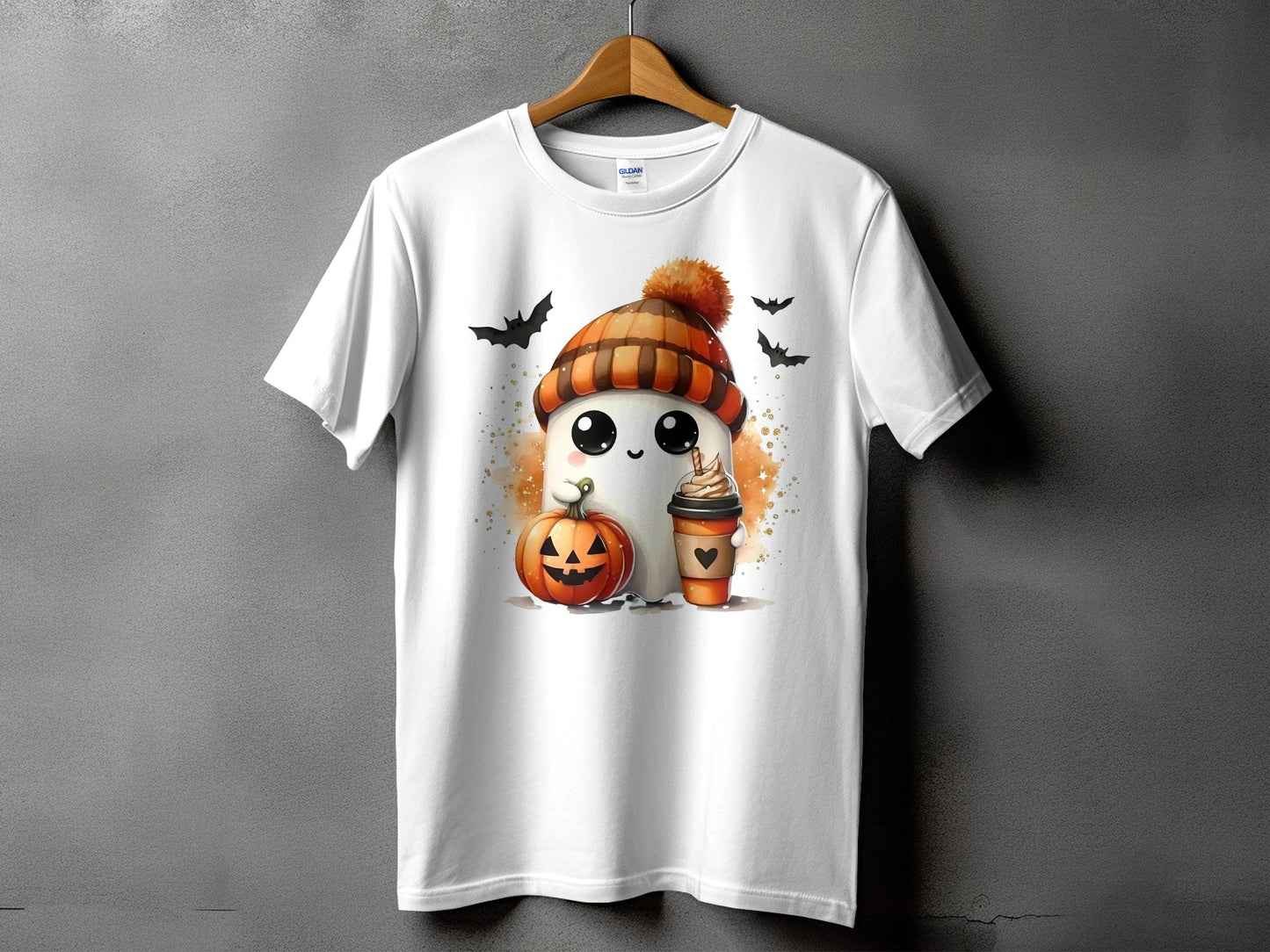White t-shirt with cartoon ghost, pumpkin, coffee, and bats graphic.