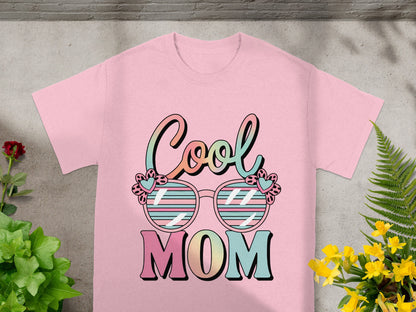 Pink t-shirt with "Cool MOM" text and sunglasses graphic.
