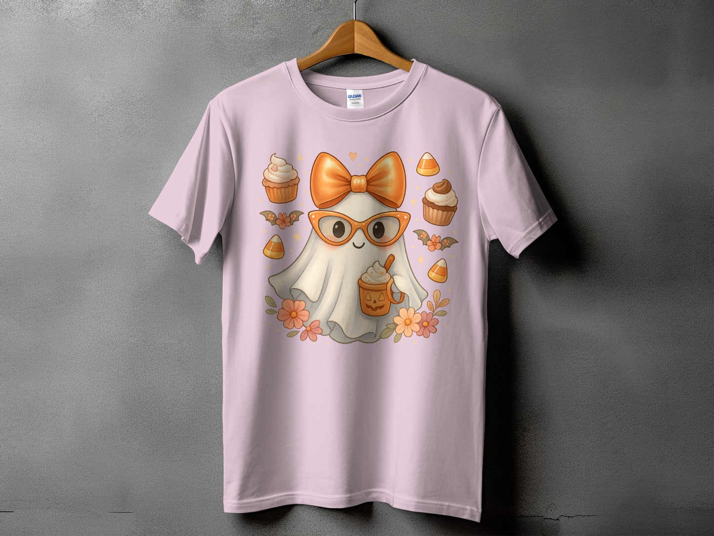 Ghost with glasses, bow, and pumpkin spice latte surrounded by cupcakes and candy corn.
