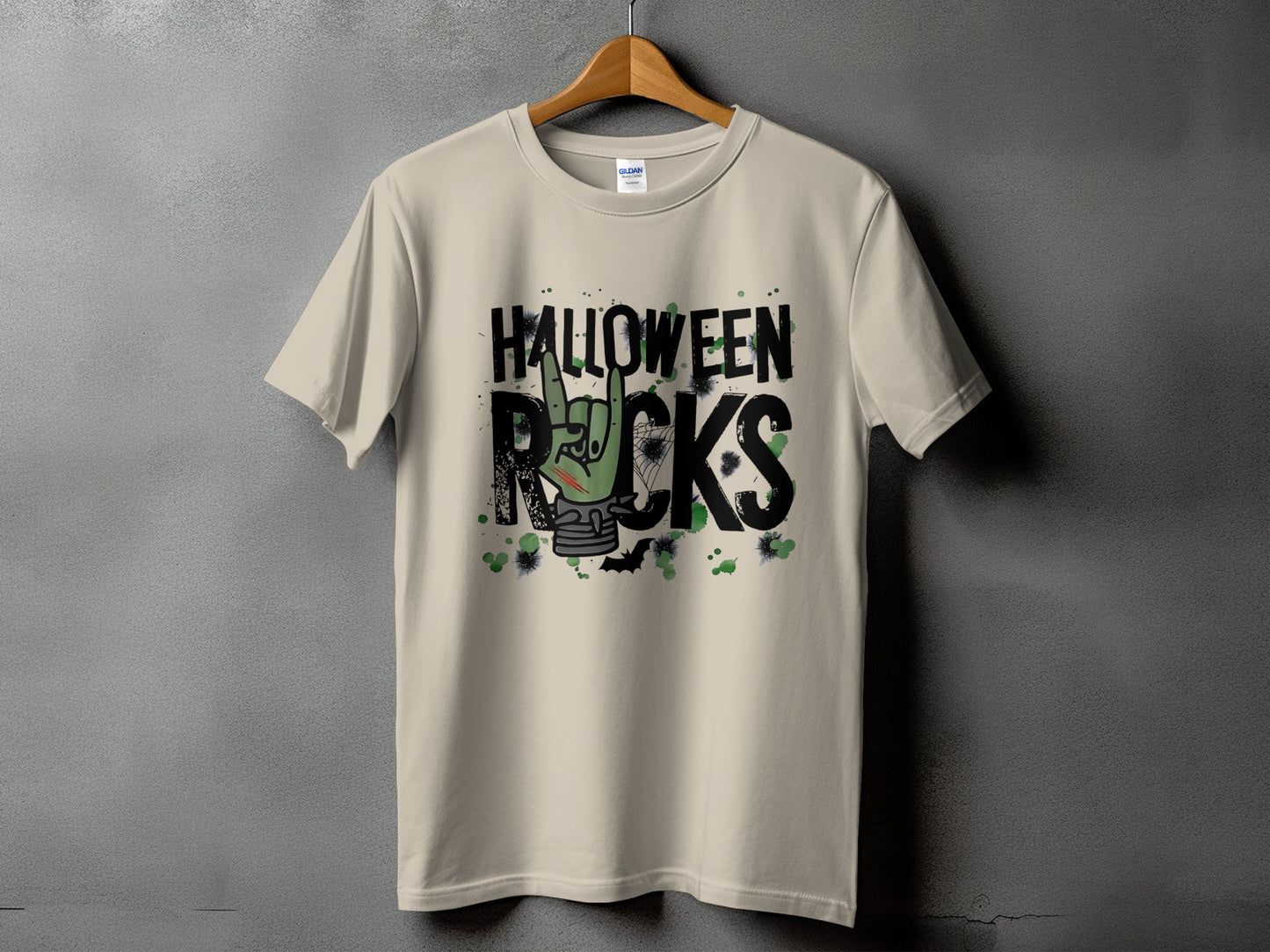 Light beige t-shirt with "Halloween Rocks" graphic featuring a skeleton hand and Halloween elements.