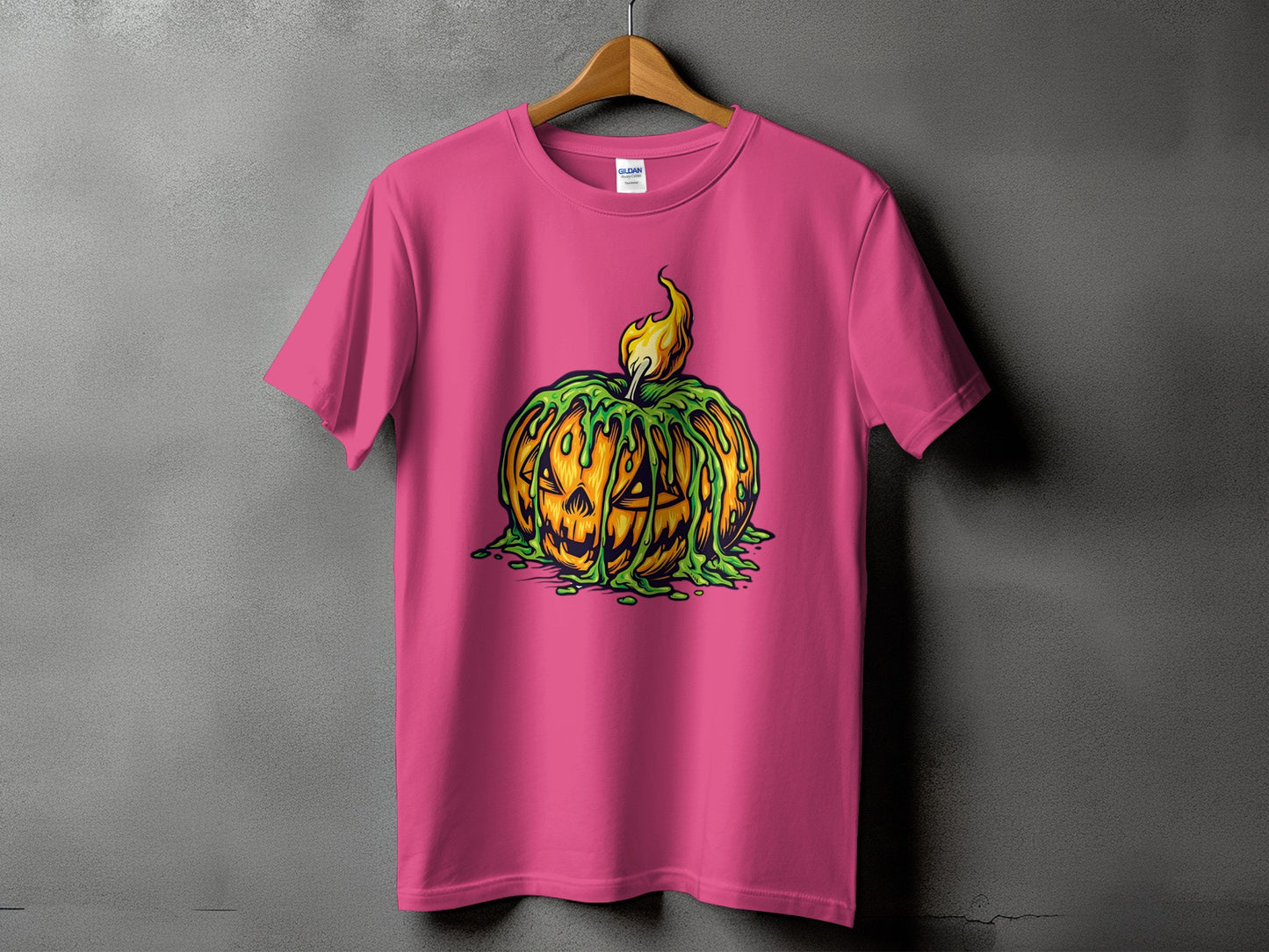 Pink t-shirt with jack-o'-lantern graphic and green slime with flame.