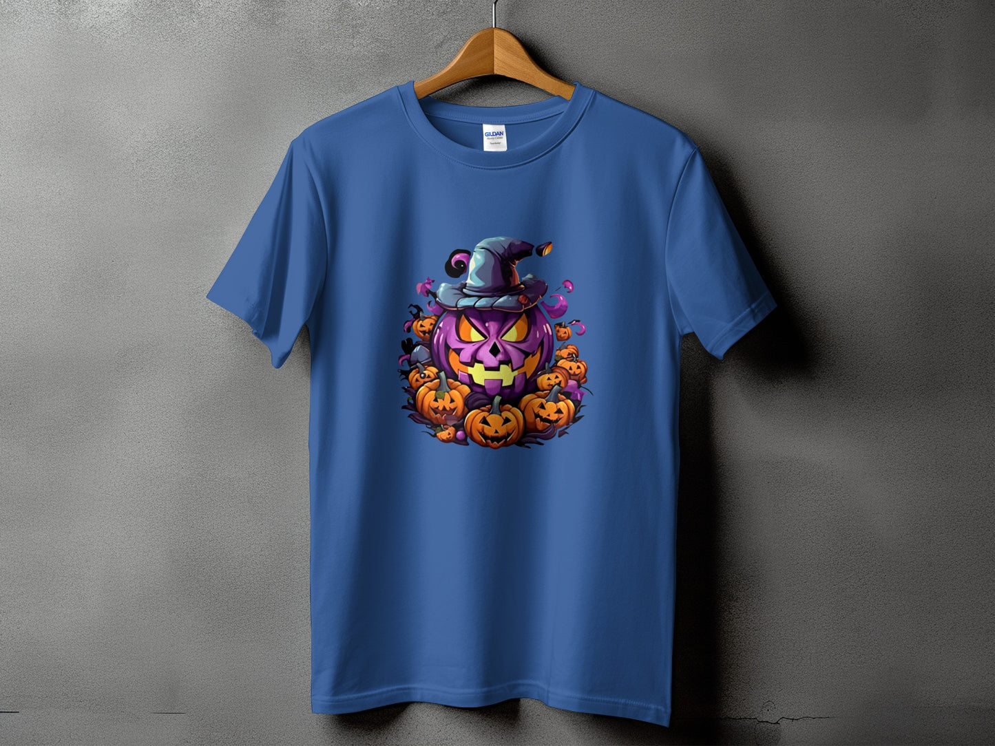 Blue t-shirt with a central Halloween graphic of a large purple jack-o'-lantern surrounded by smaller pumpkins.