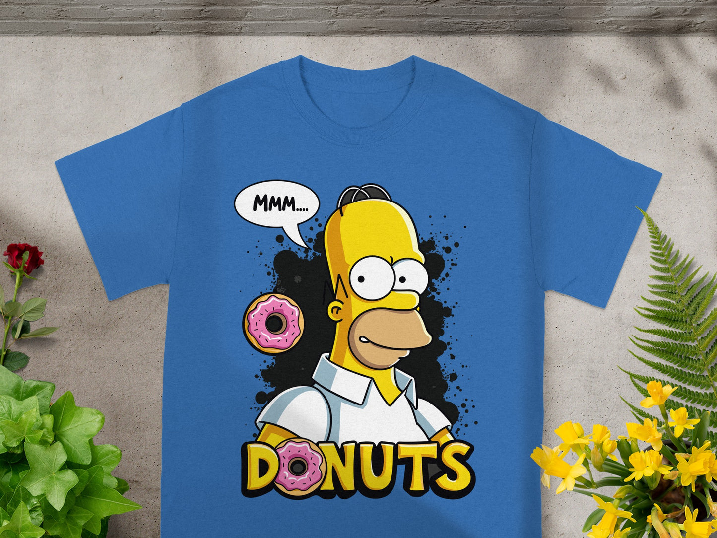 Homer Simpson saying "MMM...." with donuts around him.