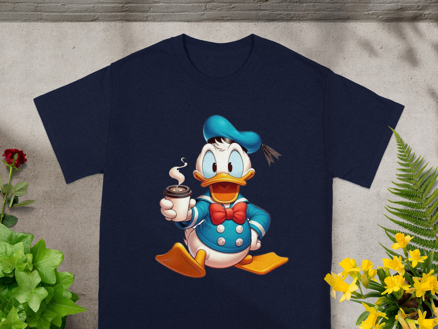 Navy t-shirt with cartoon Donald Duck holding a cup of coffee.