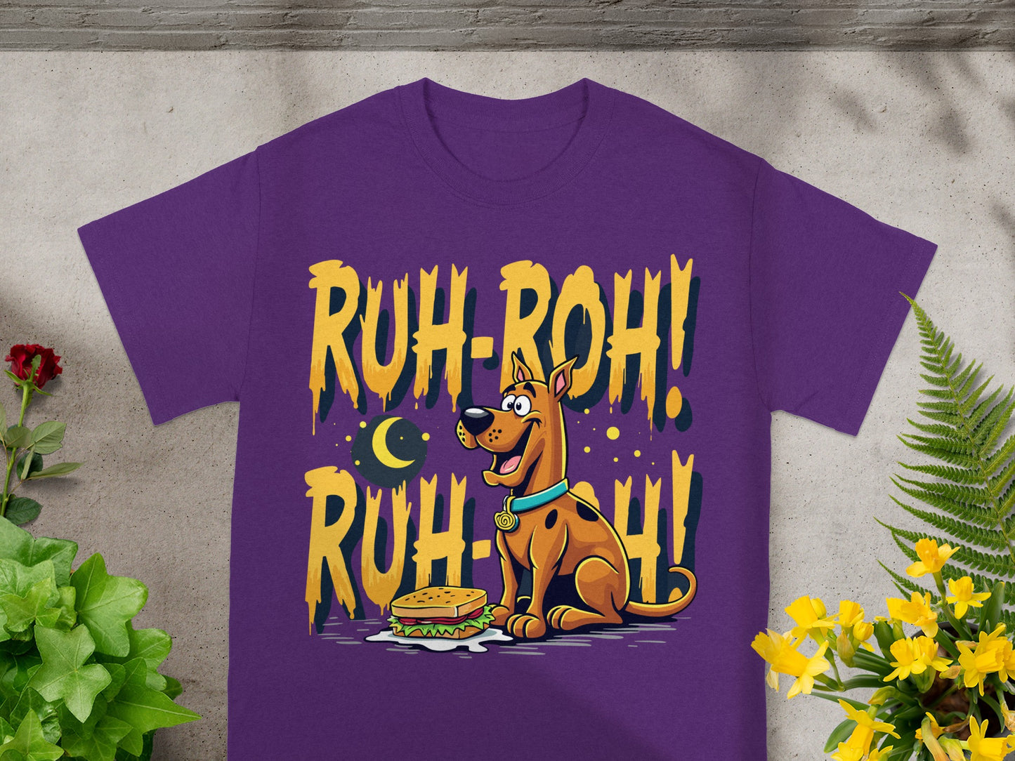 Scooby-Doo on purple t-shirt with "RUH-ROH!" and a sandwich.