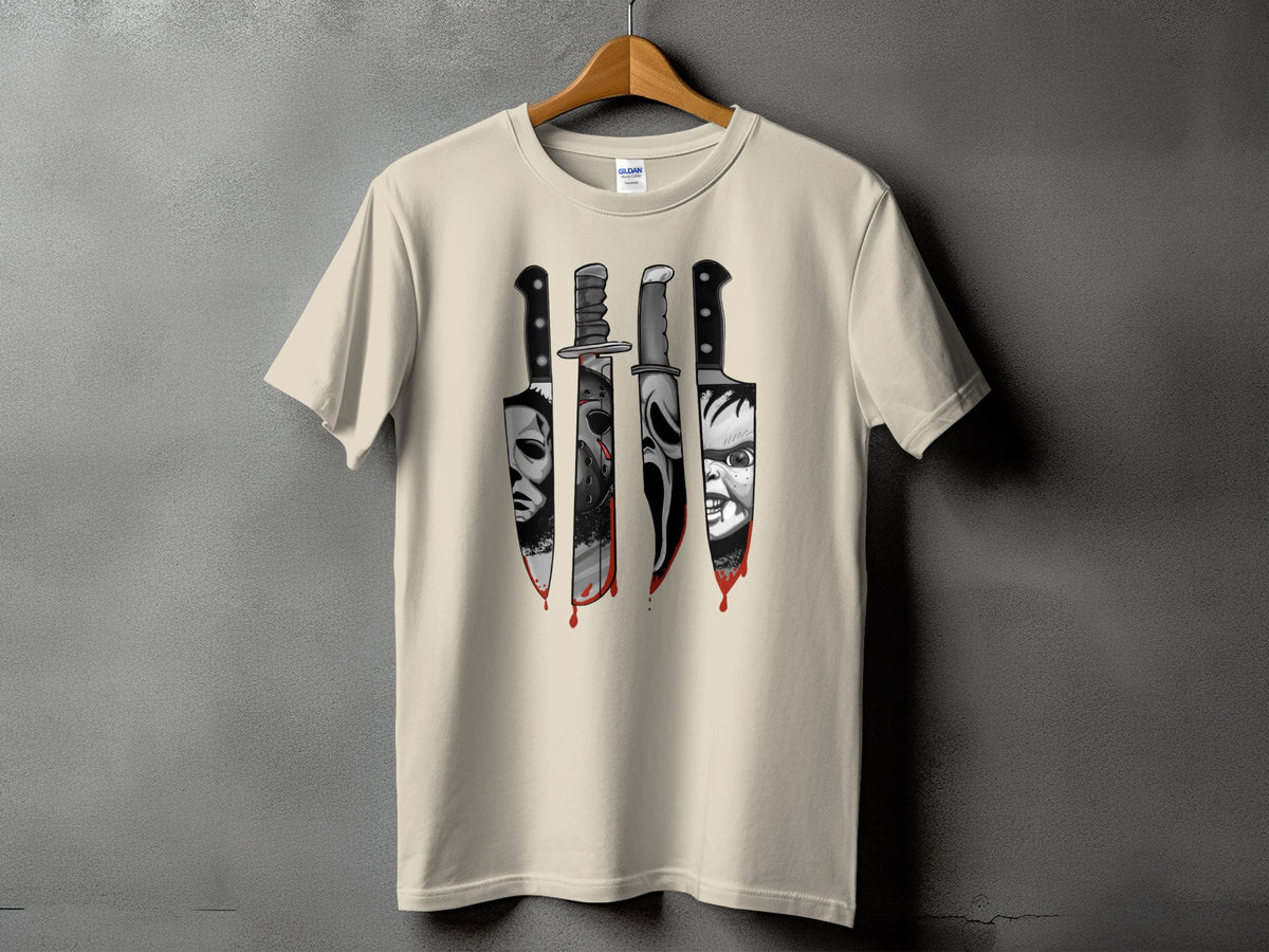 Cream t-shirt with horror movie character knives and dripping blood graphic.