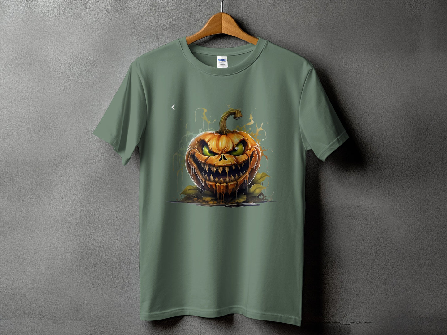 T-shirt with a graphic of a scary, dripping jack-o'-lantern and yellow splatters.