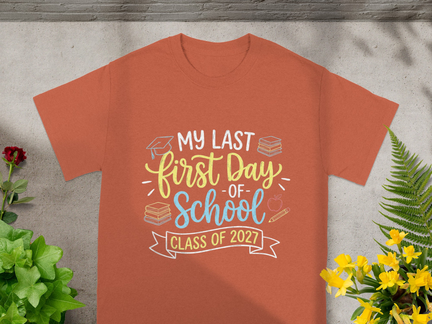 Orange t-shirt with "My Last First Day Of School Class of 2027" text.