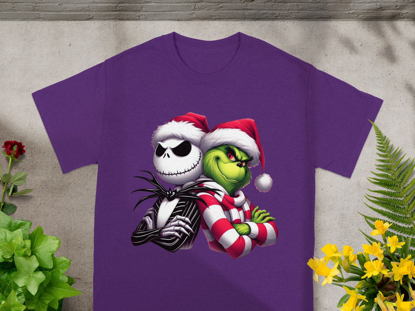 Purple t-shirt featuring Jack Skellington and the Grinch in Santa hats.