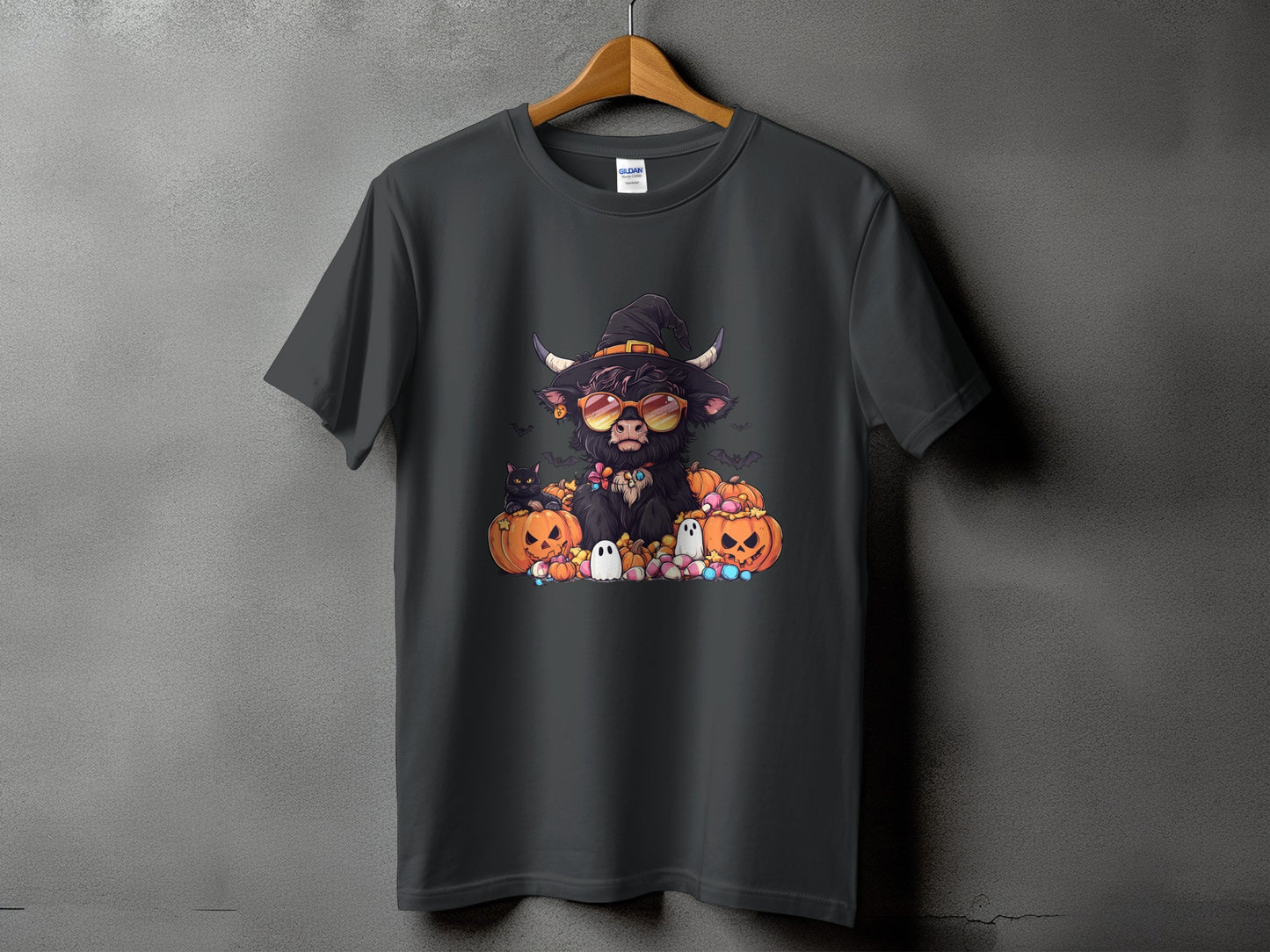 Dark gray t-shirt with Halloween Highland cow graphic, pumpkins, ghosts, and bats.