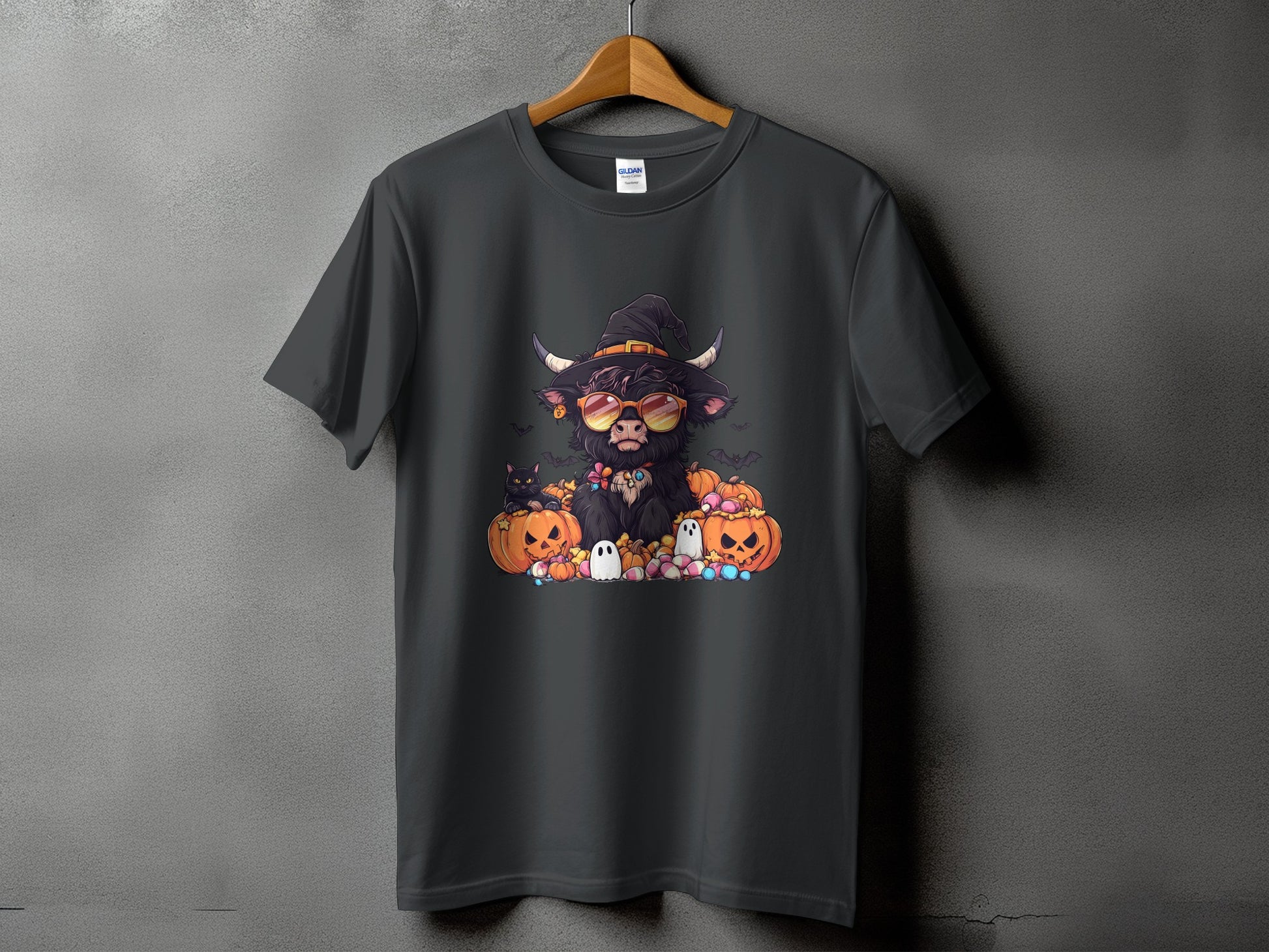 Dark gray t-shirt with Halloween Highland cow graphic, pumpkins, ghosts, and bats.