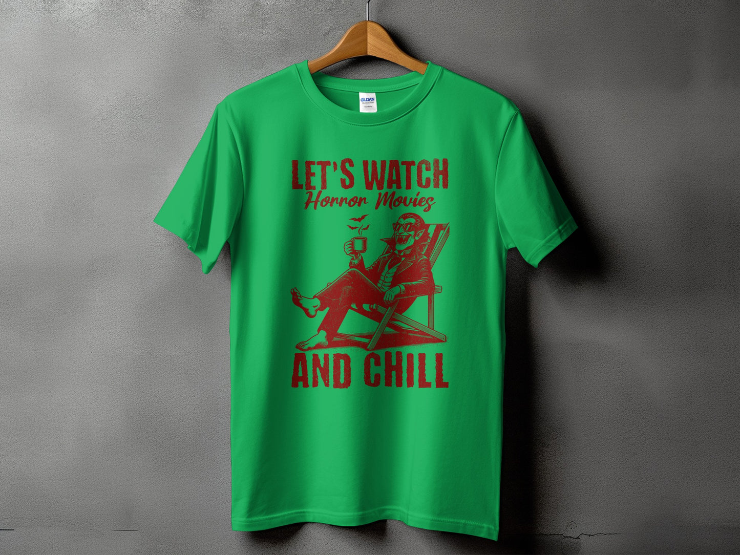 Green t-shirt with red graphic: "LET'S WATCH Horror Movies AND CHILL."