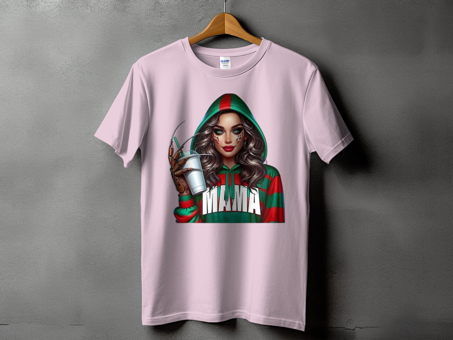 Pink t-shirt featuring a graphic of a woman in a green and red striped hoodie holding a drink.
