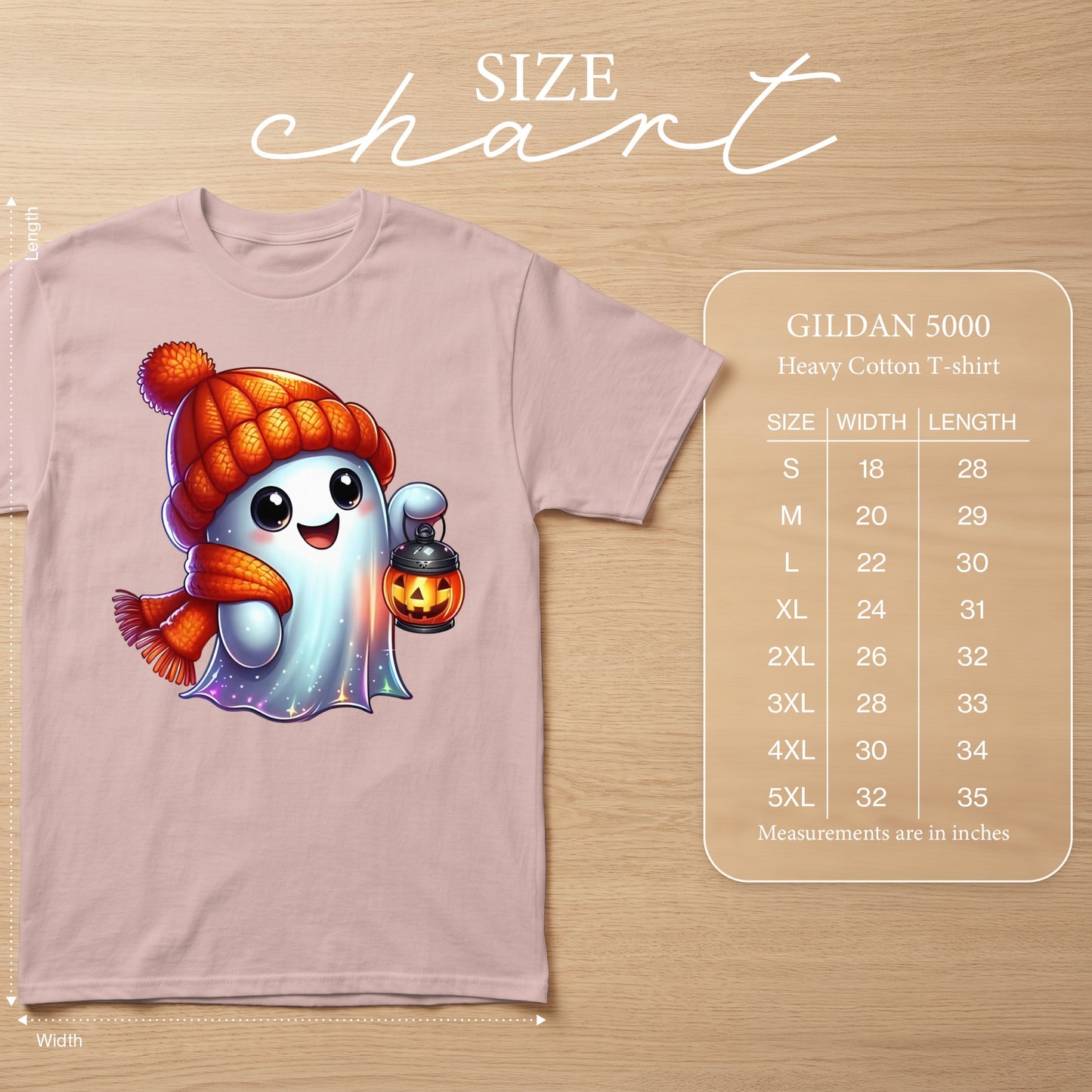 Pink Gildan 5000 t-shirt with cute ghost graphic and size chart.