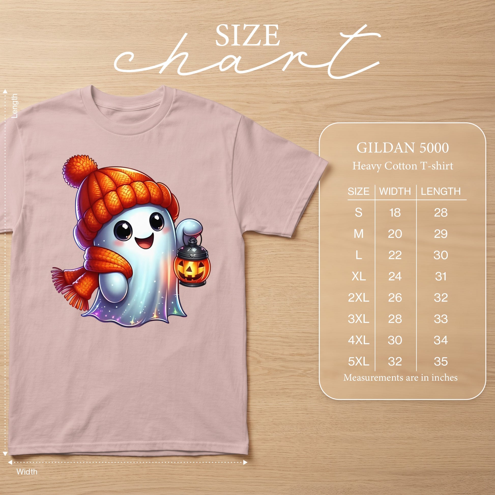 Pink Gildan 5000 t-shirt with cute ghost graphic and size chart.