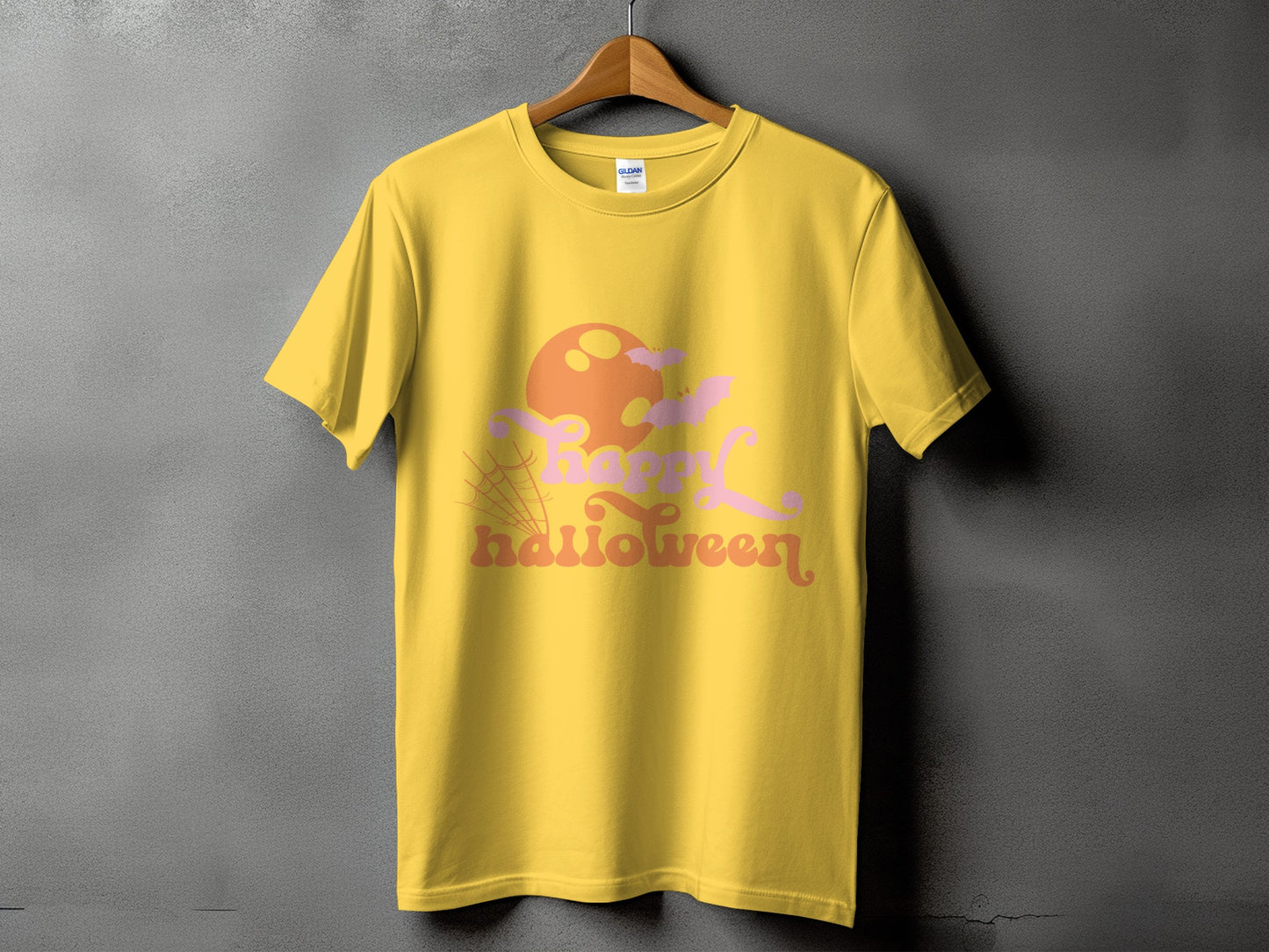 Yellow t-shirt with pink and orange "Happy Halloween" text and Halloween graphic.