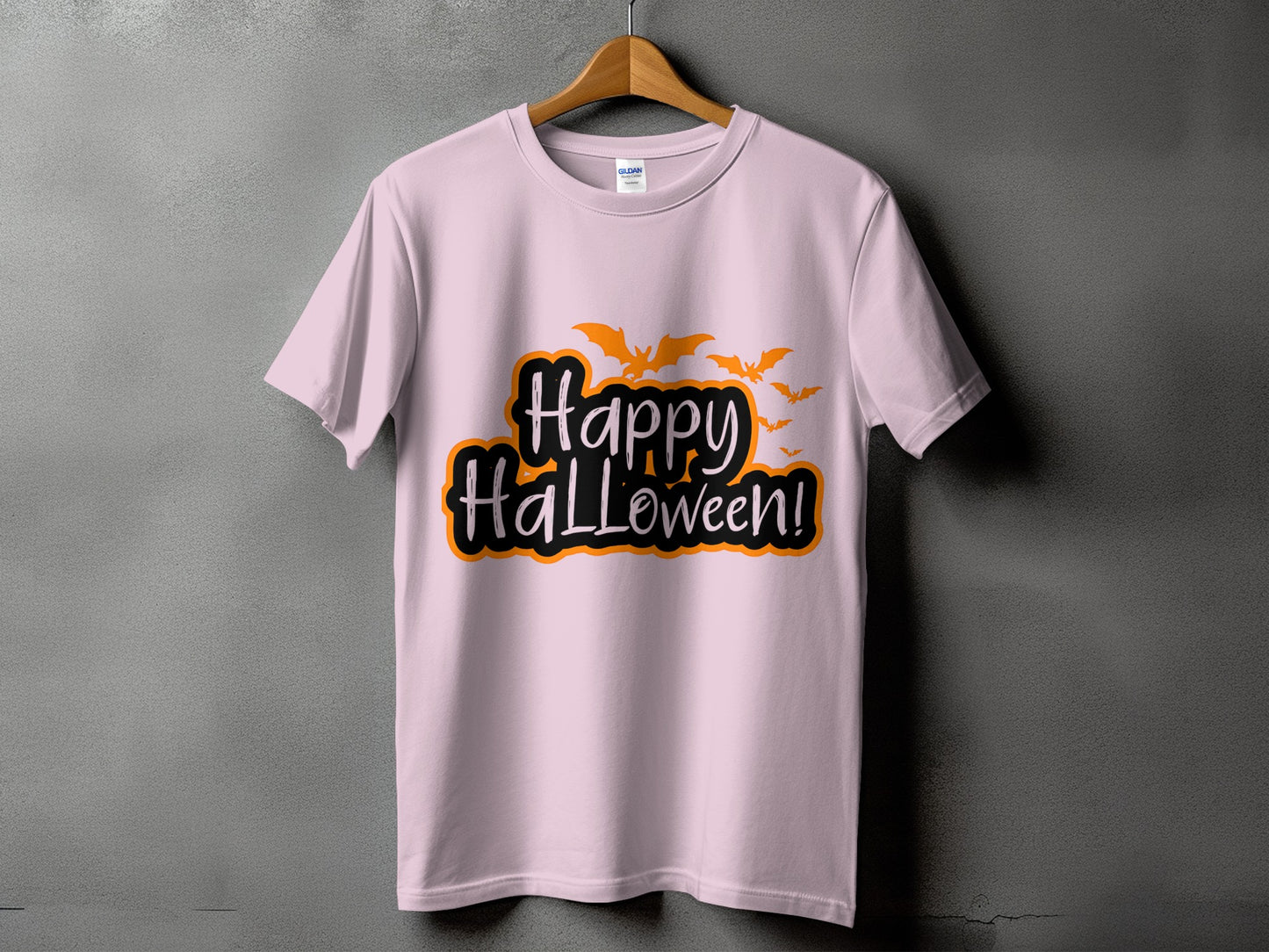 Pink t-shirt with "Happy Halloween!" text and orange bats.