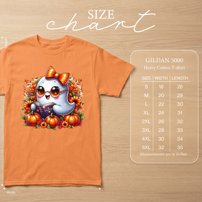 Orange t-shirt featuring a cartoon ghost reading a book with pumpkins and flowers. Size chart included.