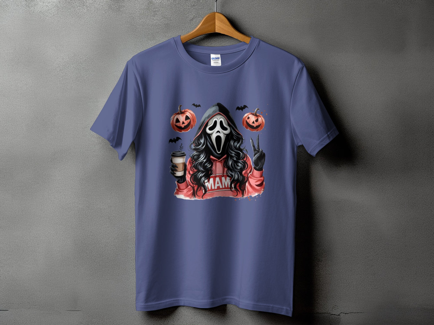 T-shirt with ghost face, pumpkins, coffee, and "MAM" text.