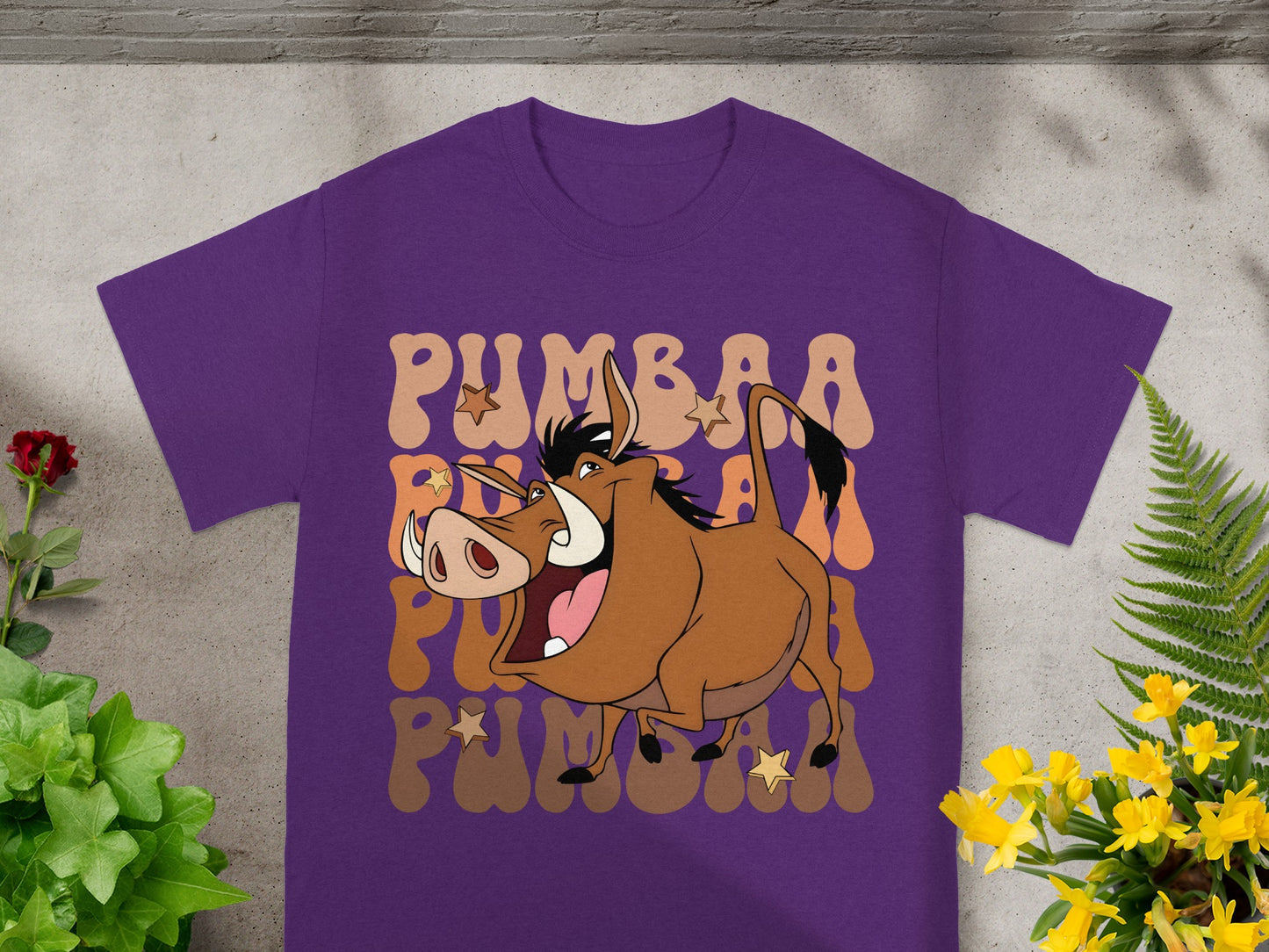 Pumbaa from The Lion King on a purple t-shirt.