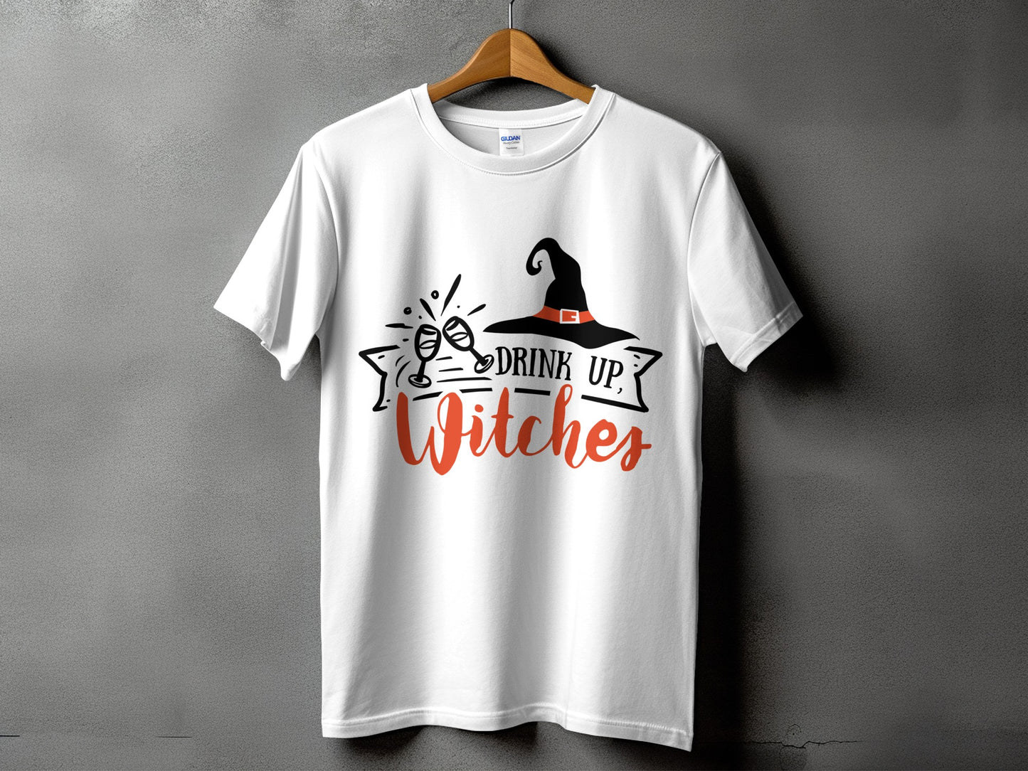 White t-shirt with "Drink Up, Witches" and witch hat graphic.