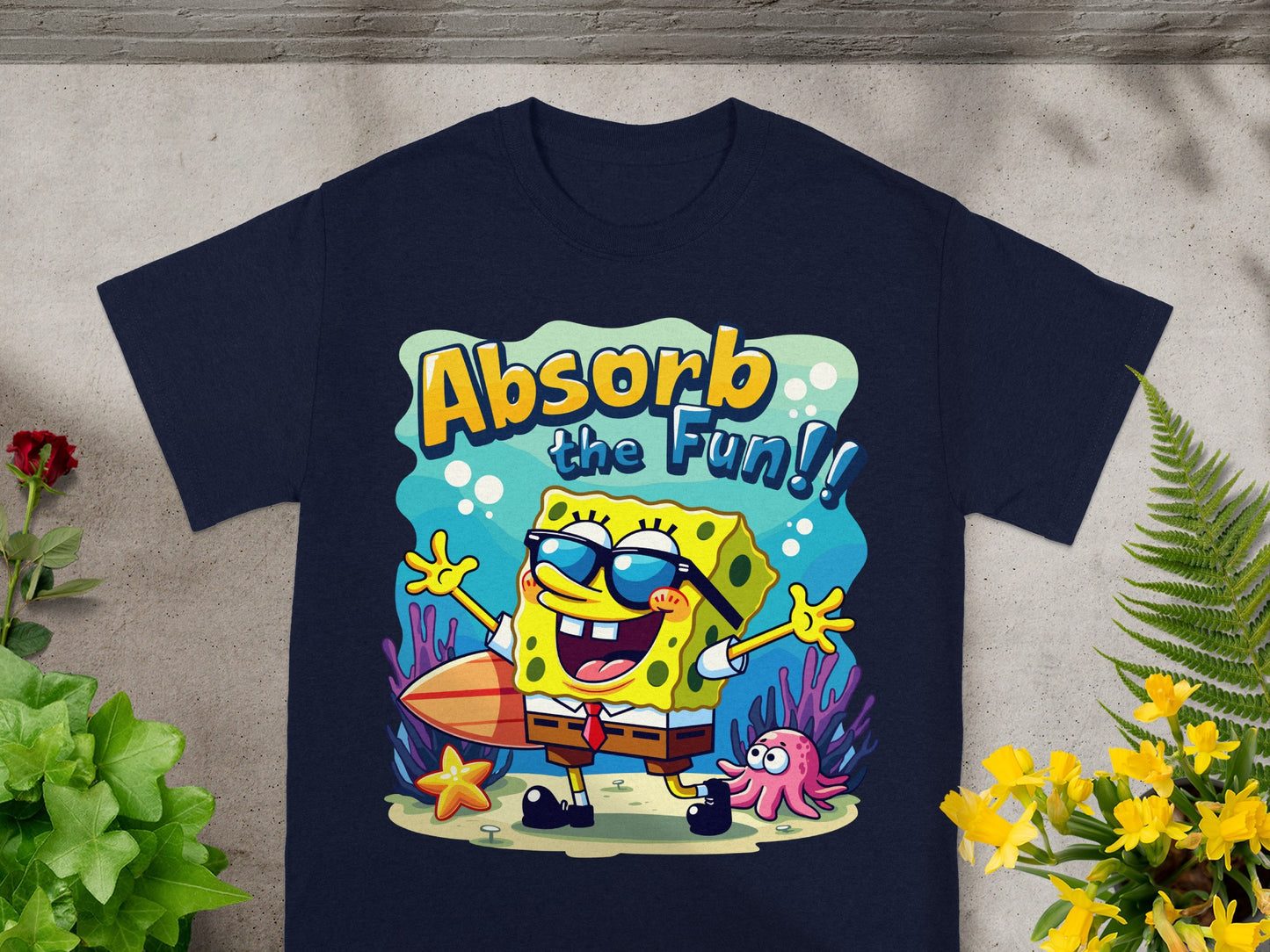 SpongeBob SquarePants t-shirt with the text "Absorb the Fun!".