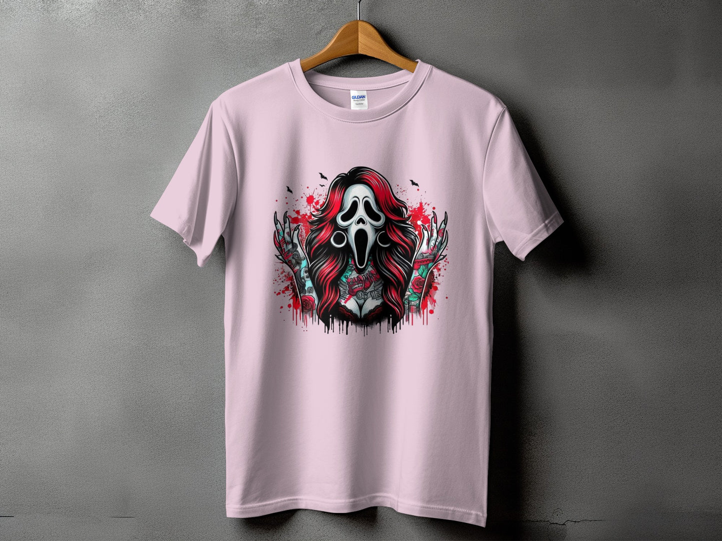 Pink t-shirt with Ghostface mask, red hair, tattoos, and roses graphic.